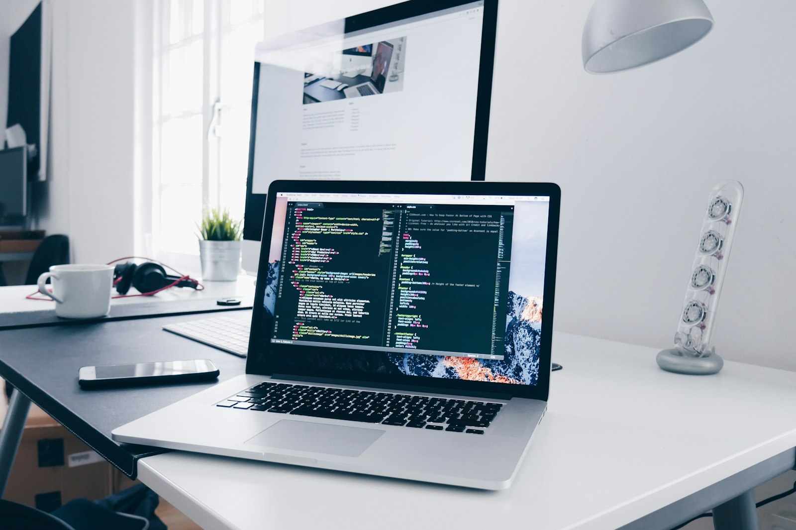 Laptop and desk setup for remote work