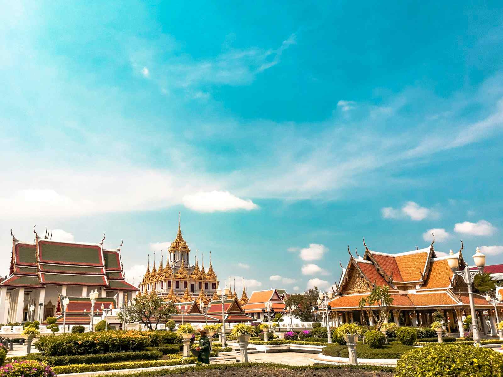 Wat Arun temple beside the Chao Phraya River at dusk, Bangkok